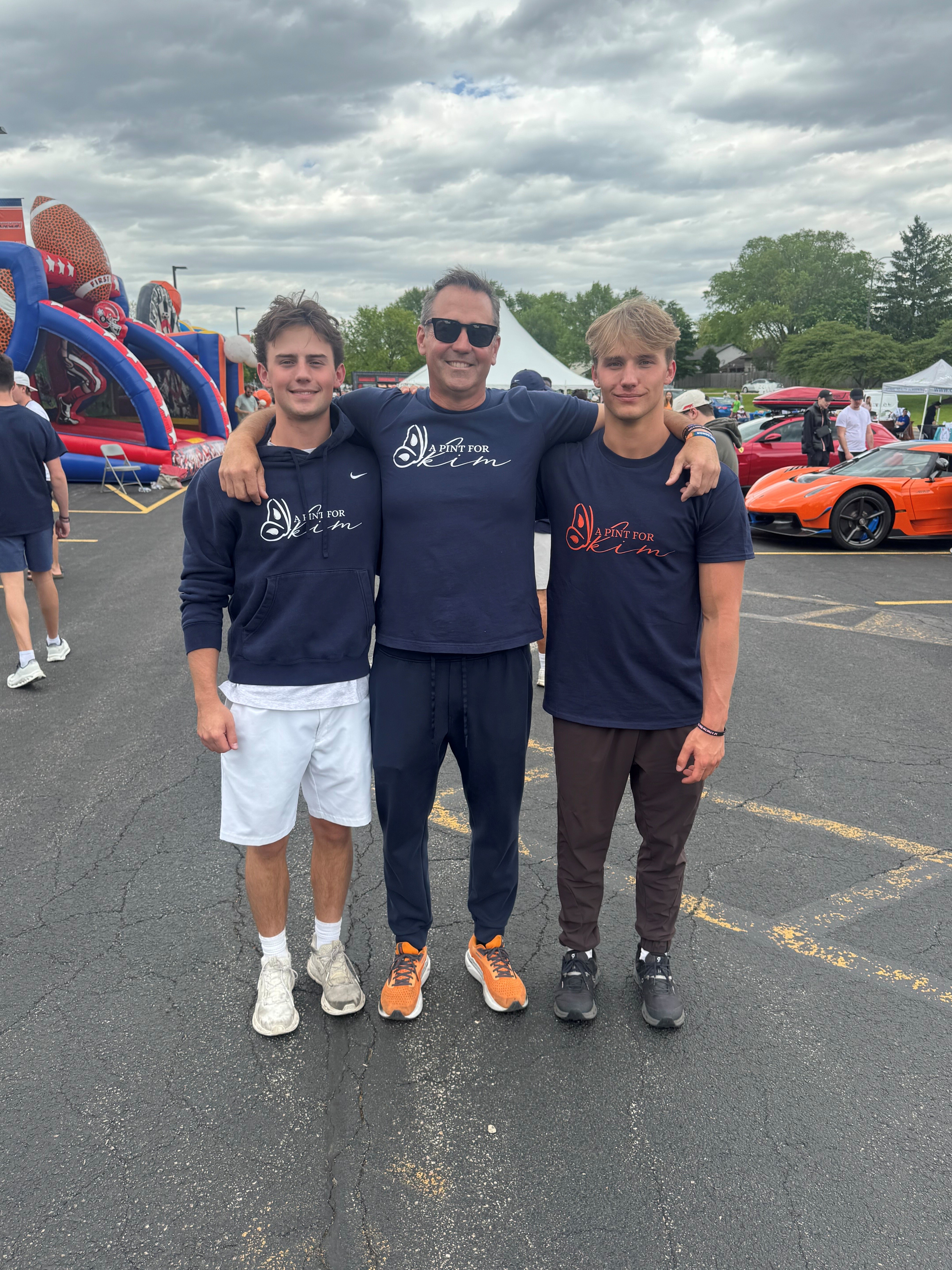Pictured Left to Right: JD Sandford (Kim's son), Rob Sandford (Kim's husband) and Ricky Sandford (Kim's Son) attend the Seventh Annual A Pint for Kim Blood Drive. Kimberley Benedyk Sandford battled a rare cancer for eight years and suffered from chemo-induced anemia, requiring more than 40 blood transfusions in the final months of her life. Prior to her passing, Kim started A Pint for Kim alongside her sisters to help others.
