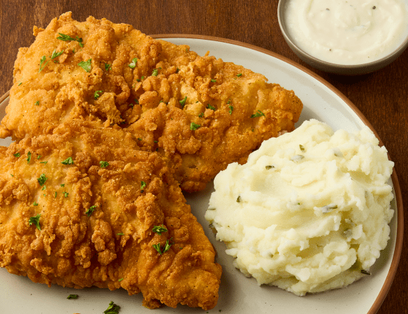 The new Big Country Fried Chicken features a full pound of hand-battered country fried chicken breasts served with mashed potatoes.