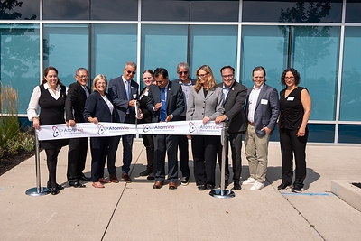 Ribbon cutting at the Grand Opening of AtomVie Global Radiopharma’s new purpose-built radiopharmaceutical manufacturing facility in Hamilton, Ontario.