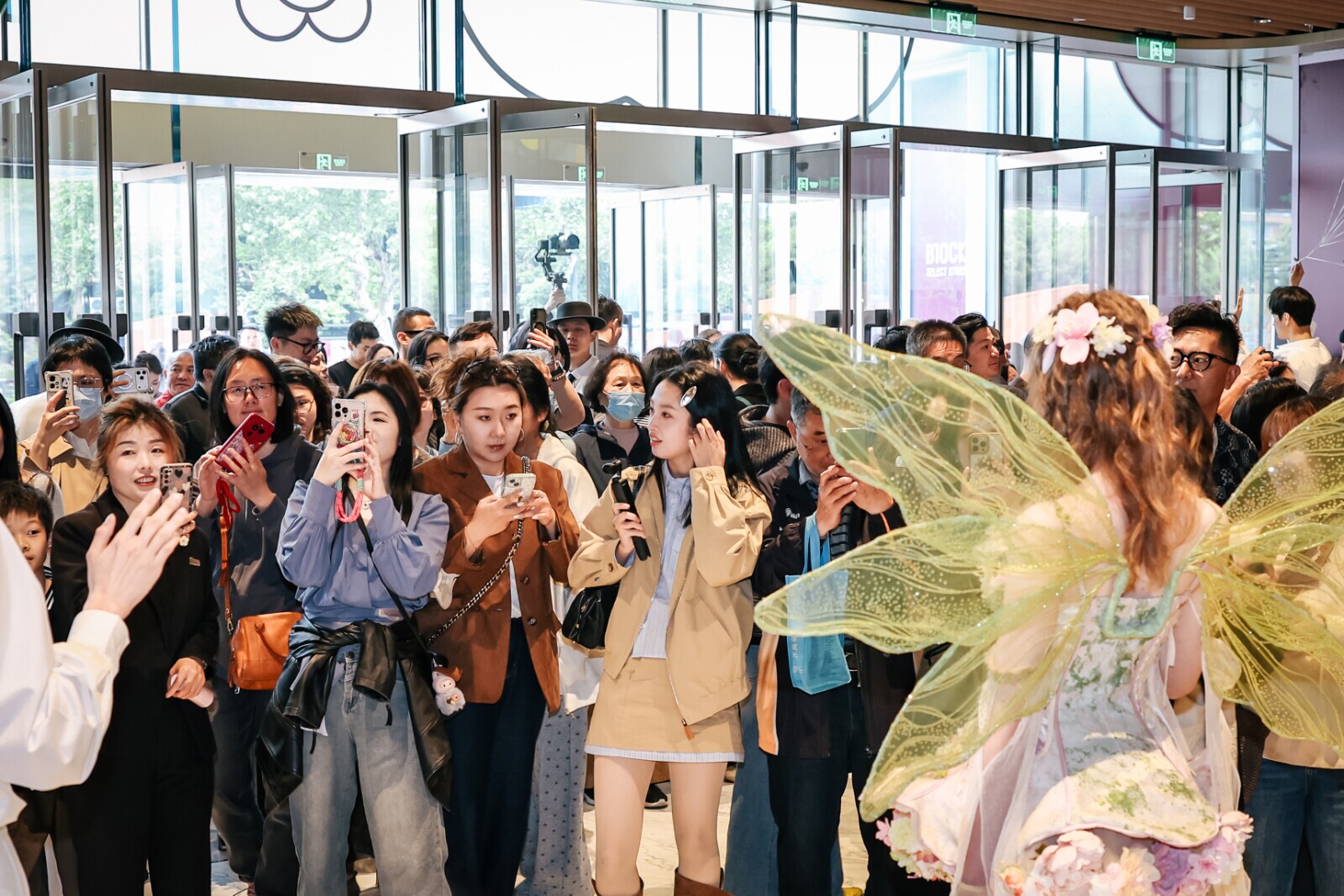 Waves of shoppers fill the Westlake 66 on its opening day