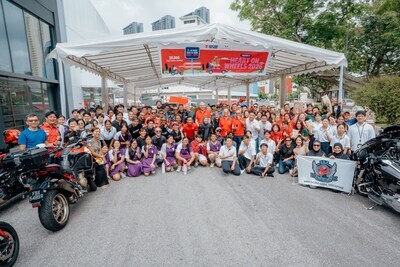 Mr Eric Chua, Senior Parliamentary Secretary and Member of Parliament for Tanjong Pagar GRC (Queenstown), pictured with representatives from automotive clubs, school students, Food from the Heart volunteers, and members of the public who turned up to donate at Heart on Wheels 2026.
