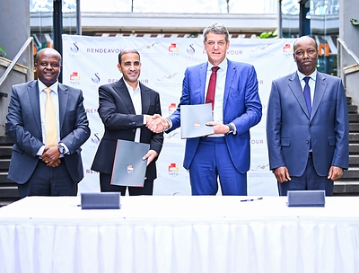 John Mwendwa, OGW, CEO, InvestKenya; Abdullah AlMalki, Chairman, Mabani Aljazeera Holdings Group; Stephen Jennings, Founder and CEO of Rendeavour, the owner and developer of Tatu City;and Hon. Lee Kinyanjui, CS for Investments, Trade, and Industry, during the signing of an agreement under which the Saudi Arabian construction and investment company, Mabani, will acquire a 50% minus one share stake of Tatu City’s Jabali Towers mixed-use development in Kenya.