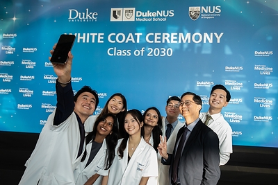 Aspiring doctors from the Class of 2030 with Prof Patrick Tan, Dean of Duke-NUS, as they take the first step towards realising their medical dreams // Photo credit: Duke-NUS Medical School