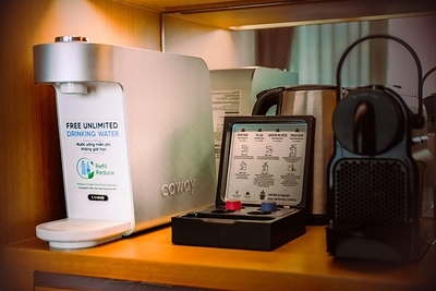 A Coway P-350N water purifier installed in the minibar area at Prince Hotel Da Nang, offering guests instant access to clean, safe, and unlimited drinking water. A Coway P-350N water purifier installed in the minibar area at Prince Hotel Da Nang, offering guests instant access to clean, safe, and unlimited drinking water.